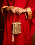 Adhika (Potli)