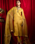 ANISHA SETHI IN SUHANI MUSTARD TISSUE HANDCRAFTED KURTA SET