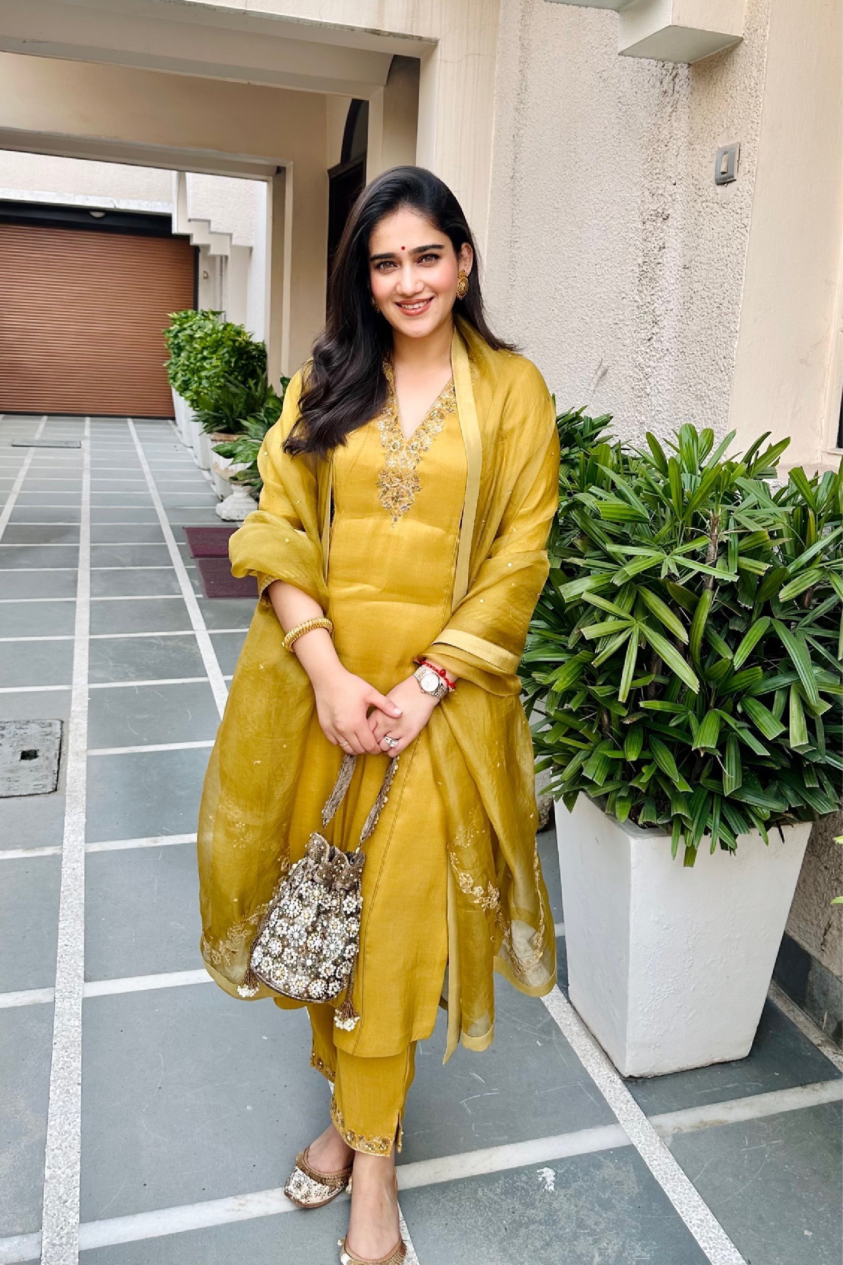 ANISHA SETHI IN SUHANI MUSTARD TISSUE HANDCRAFTED KURTA SET