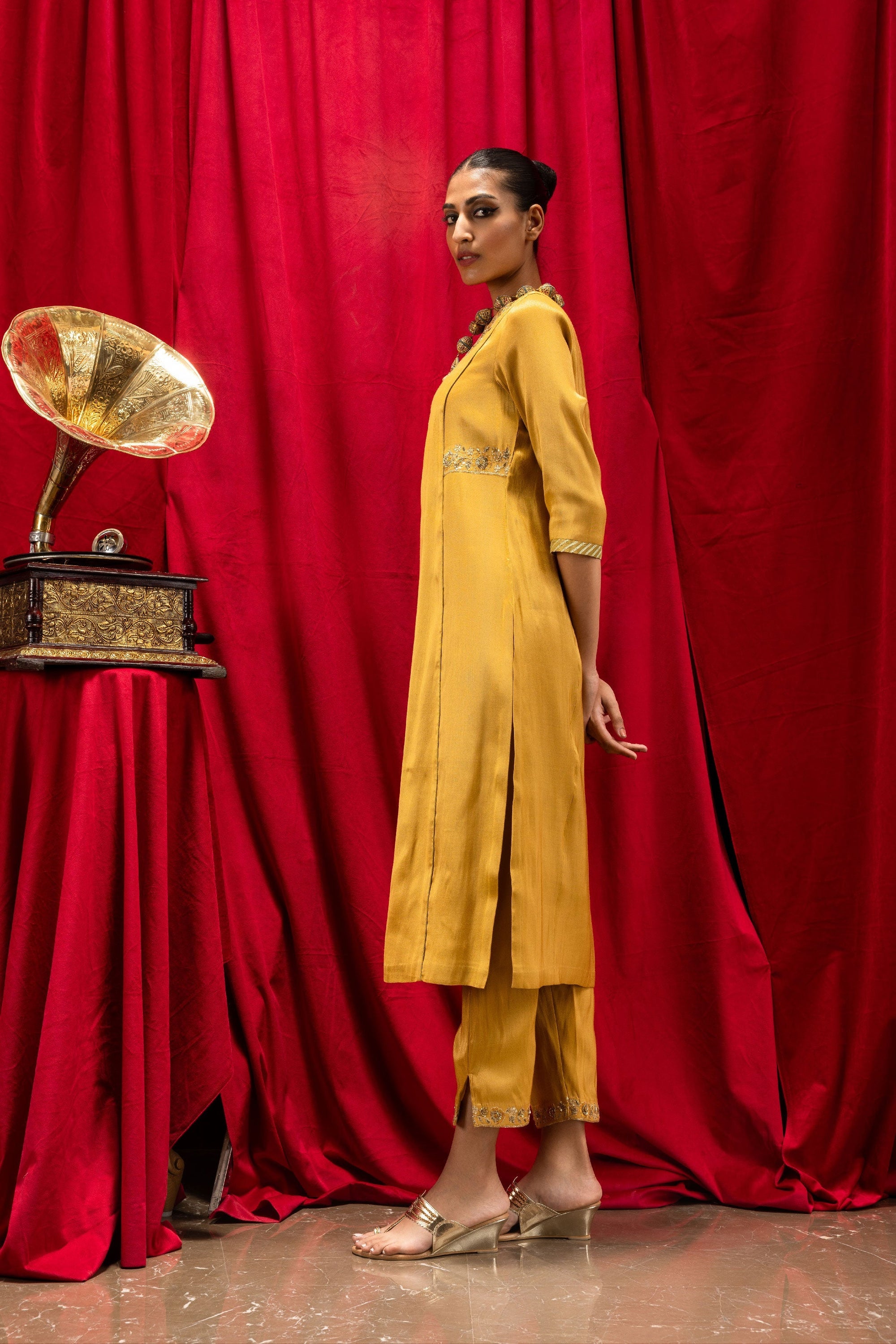 ANISHA SETHI IN SUHANI MUSTARD TISSUE HANDCRAFTED KURTA SET
