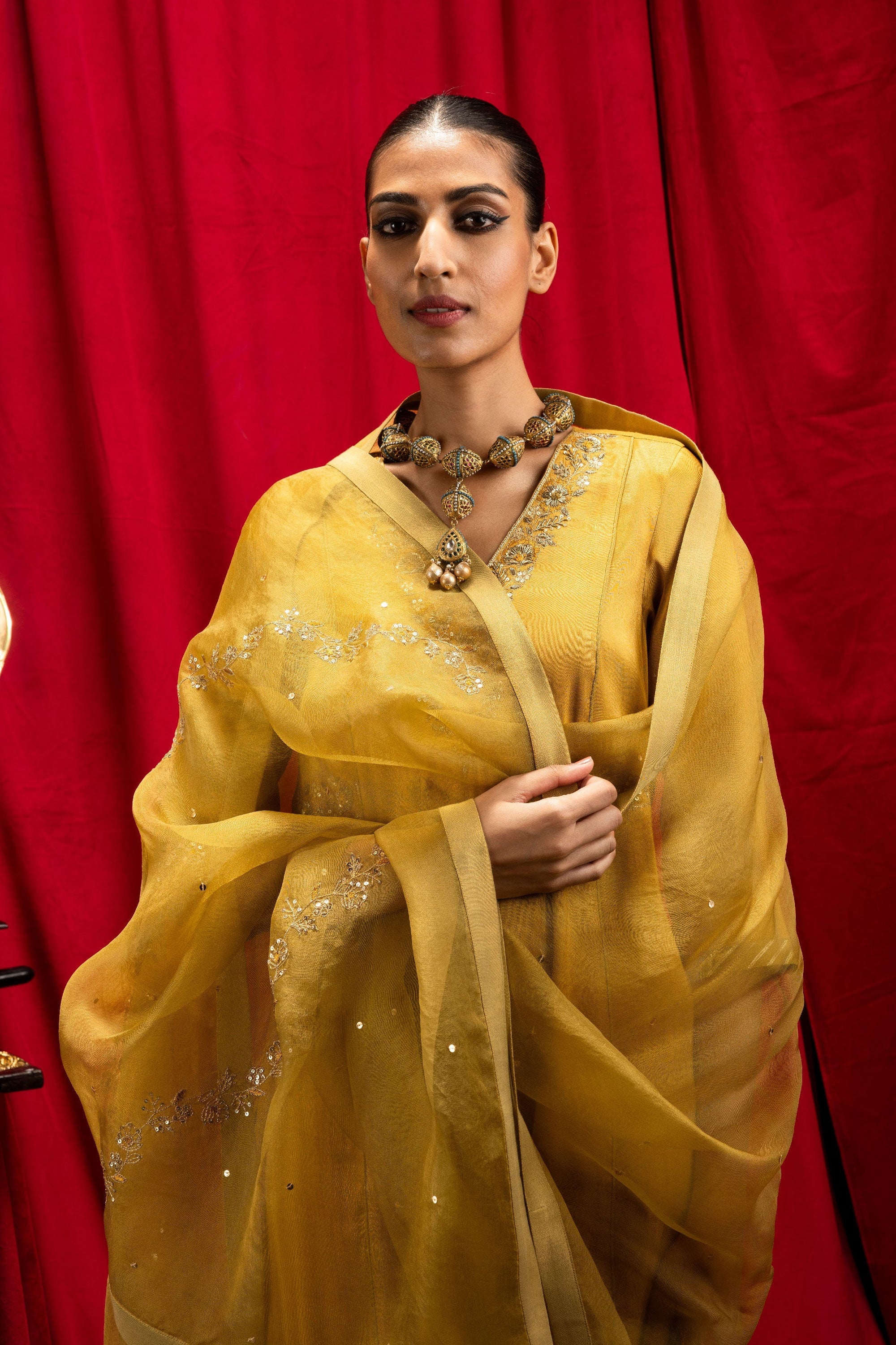 ANISHA SETHI IN SUHANI MUSTARD TISSUE HANDCRAFTED KURTA SET