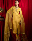 ANISHA SETHI IN SUHANI MUSTARD TISSUE HANDCRAFTED KURTA SET